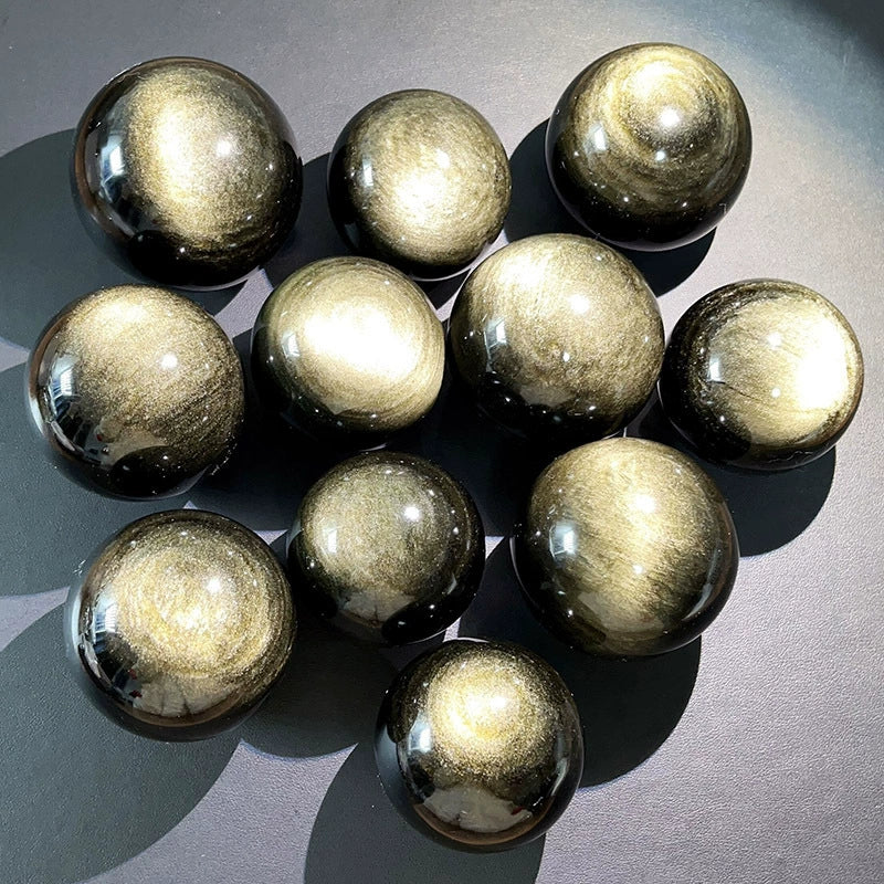 Golden obsidian ball ornament