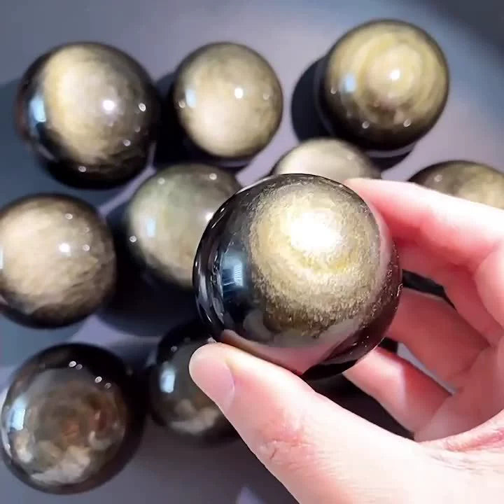 Golden obsidian ball ornament